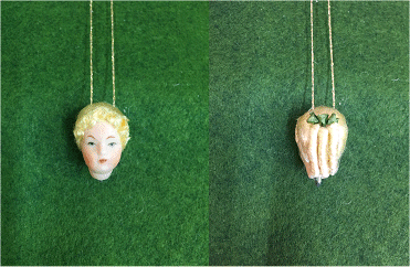 No 1 Official Porcelain Dolls head for Cross n Patch Angel patterns. Blonde hair in 3 ringlets with green ribbon.  