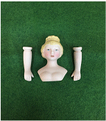 Painted blonde hair on a Large Porcelain Dolls head with arms.