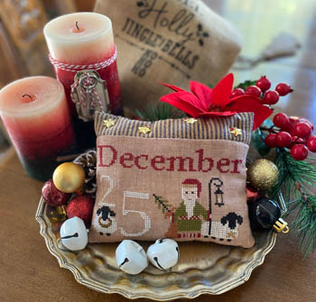 December 25th Pillow by Mani di Donna  